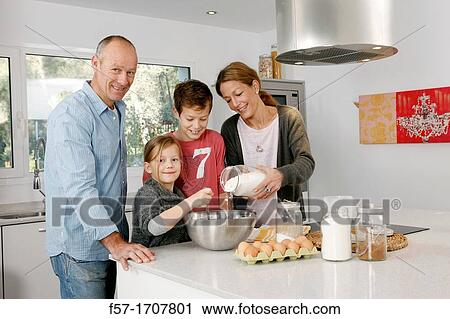 Family in the kitchen View Large Photo Image Stock Image - Family in the kitchen. Fotosearch