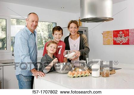 Family in the kitchen View Large Photo Image Stock Image - Family in the kitchen. Fotosearch