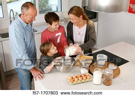 Family in the kitchen View Large Photo Image Stock Image - Family in the kitchen. Fotosearch