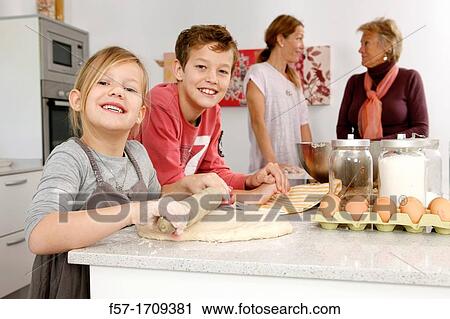 Family in the kitchen View Large Photo Image Stock Image - Family in the kitchen. Fotosearch