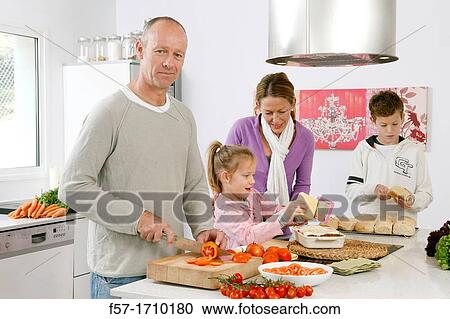 Family in the kitchen View Large Photo Image Stock Image - Family in the kitchen. Fotosearch