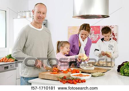 Stock Image - Family in the kitchen. Fotosearch