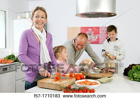 Family in the kitchen View Large Photo Image Stock Image - Family in the kitchen. Fotosearch