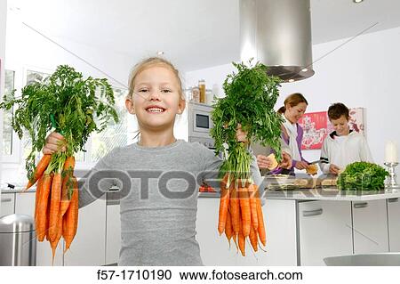 Family in the kitchen View Large Photo Image Stock Image - Family in the kitchen. Fotosearch