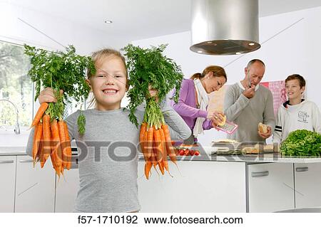 Family in the kitchen View Large Photo Image Stock Image - Family in the kitchen. Fotosearch
