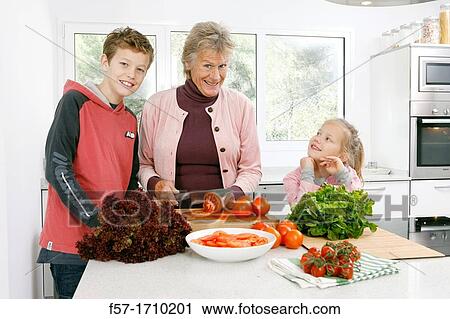 Family in the kitchen View Large Photo Image Stock Image - Family in the kitchen. Fotosearch