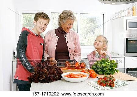 Family in the kitchen View Large Photo Image Stock Image - Family in the kitchen. Fotosearch