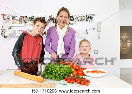 Family in the kitchen View Large Photo Image Stock Image - Family in the kitchen. Fotosearch