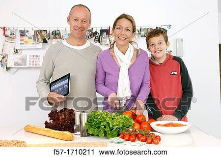 Family in the kitchen View Large Photo Image Stock Image - Family in the kitchen. Fotosearch