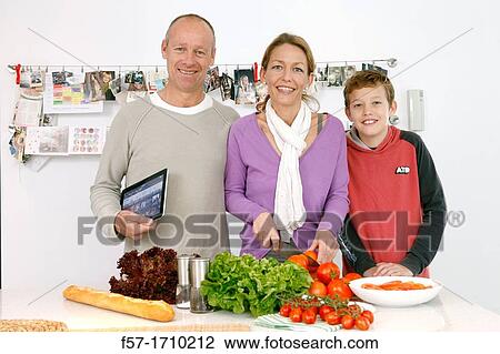 Family in the kitchen View Large Photo Image Stock Image - Family in the kitchen. Fotosearch