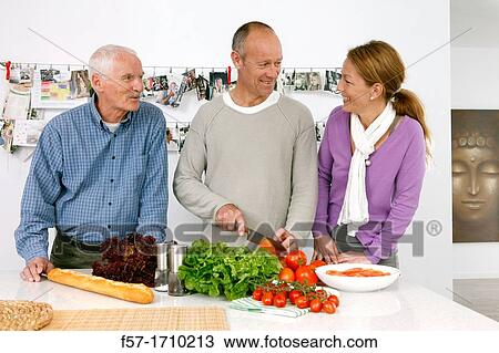 Stock Image - Family in the kitchen. Fotosearch