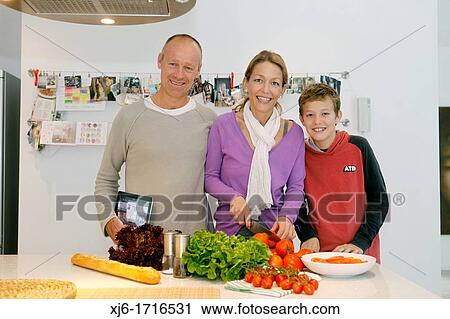 Family in the kitchen View Large Photo Image Stock Image - Family in the kitchen. Fotosearch