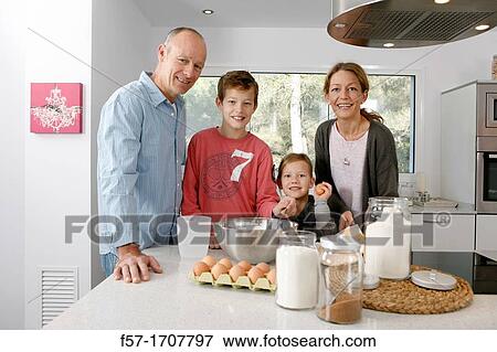 Family in the kitchen View Large Photo Image Stock Photo - Family in the kitchen. Fotosearch