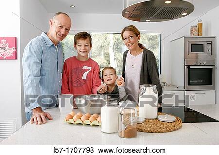Stock Photo - Family in the kitchen. Fotosearch