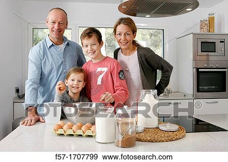 Family in the kitchen View Large Photo Image Stock Photo - Family in the kitchen. Fotosearch