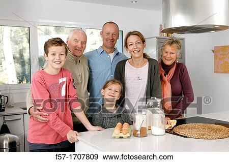Family in the kitchen View Large Photo Image Stock Photo - Family in the kitchen. Fotosearch