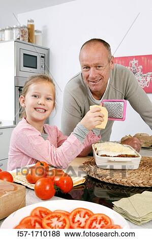 Family in the kitchen View Large Photo Image Stock Photo - Family in the kitchen. Fotosearch