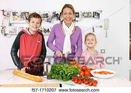 Family in the kitchen View Large Photo Image Stock Photo - Family in the kitchen. Fotosearch