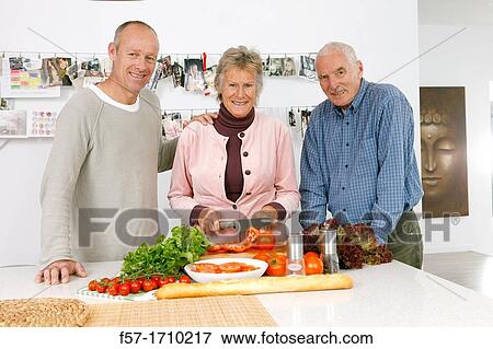 Family in the kitchen View Large Photo Image Stock Photo - Family in the kitchen. Fotosearch