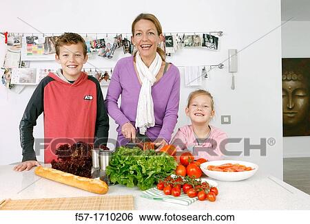 Family in the kitchen View Large Photo Image Stock Photograph - Family in the kitchen. Fotosearch