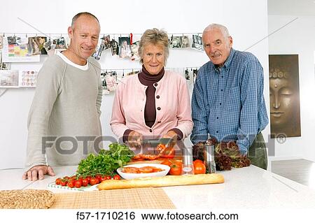 Stock Photograph - Family in the kitchen. Fotosearch