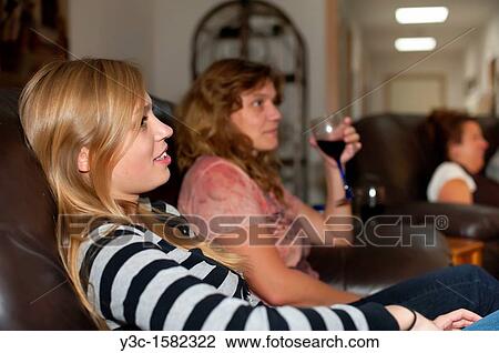 Family livingroom - women relaxing and enjoying leisure-time View Large Photo Image Stock Image - Family livingroom - women relaxing and enjoying leisure-time. Fotosearch