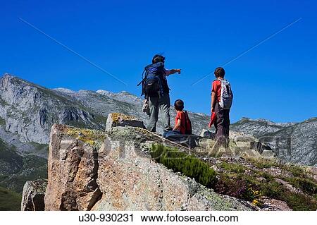 Family of mountaineers in the summit of Cueto Moro in the? ndara massif, Picos de Europa National Park, Bejes in the municipality of Cillorigo de Li? bana, in Cantabria, Spain View Large Photo Image Stock Image - Family of mountaineers in the summit of Cueto Moro in the? ndara massif, Picos de Europa National Park, Bejes in the municipality of Cillorigo de Li? bana, in Cantabria, Spain. Fotosearch