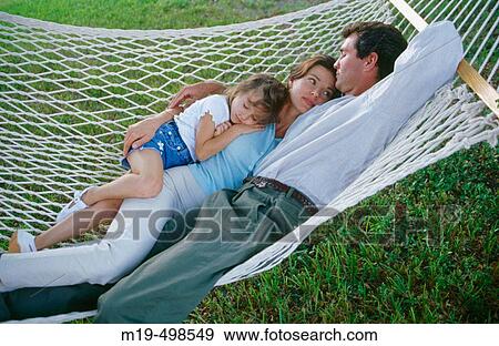 family of three on a hammock View Large Photo Image Stock Photo - family of three on a hammock. Fotosearch
