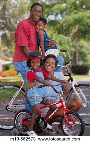 family on bicycles View Large Photo Image Stock Image - family on bicycles. Fotosearch