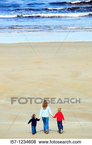 family on sandy beach, Sutherland, Scotland View Large Photo Image Stock Photo - family on sandy beach, Sutherland, Scotland. Fotosearch