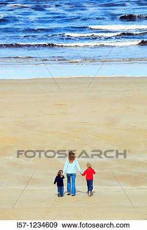 family on sandy beach, Sutherland, Scotland View Large Photo Image Stock Photo - family on sandy beach, Sutherland, Scotland. Fotosearch