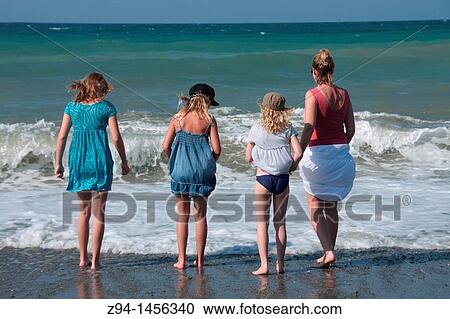 Family on the beach View Large Photo Image Stock Image - Family on the beach. Fotosearch