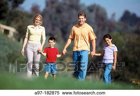 Family out for a walk View Large Photo Image Stock Photography - Family out for a walk. Fotosearch