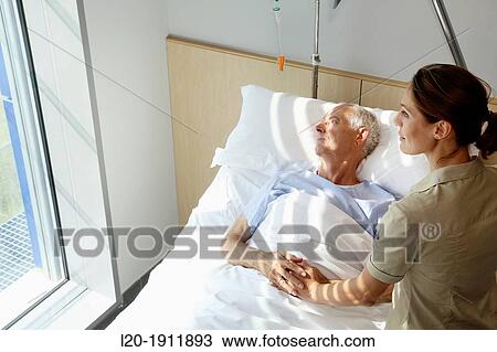 family patient hospital room, Onkologikoa Hospital, Oncology Institute, Case Center for prevention, diagnosis and treatment of cancer, Donostia, San Sebastian, Gipuzkoa, Basque Country, Spain View Large Photo Image Stock Image - family patient hospital room, Onkologikoa Hospital, Oncology Institute, Case Center for prevention, diagnosis and treatment of cancer, Donostia, San Sebastian, Gipuzkoa, Basque Country, Spain. Fotosearch