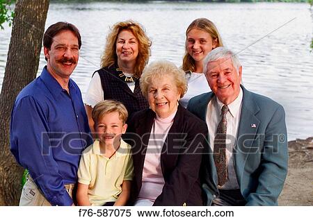 Family portrait, including parents, children and grandparents. View Large Photo Image Stock Photography - Family portrait, including parents, children and grandparents.. Fotosearch