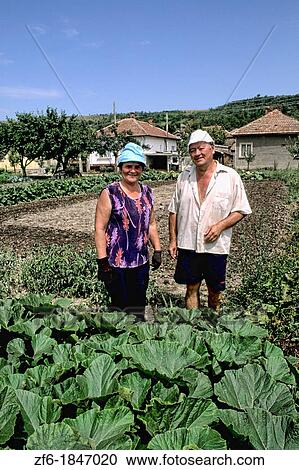 Family portrait while gardening in yard near Sofia Bulgaria. View Large Photo Image Stock Image - Family portrait while gardening in yard near Sofia Bulgaria.. Fotosearch