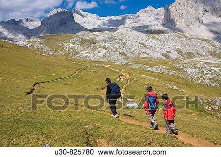 Family practice mountaineering in the? ndara massif, of walking in the Picos de Europa, the background, the top to the bottom Pea Vieja y Pea Olvidada in Urrielles Massif Cantabria, Spain, Europe View Large Photo Image Stock Image - Family practice mountaineering in the? ndara massif, of walking in the Picos de Europa, the background, the top to the bottom Pea Vieja y Pea Olvidada in Urrielles Massif Cantabria, Spain, Europe. Fotosearch