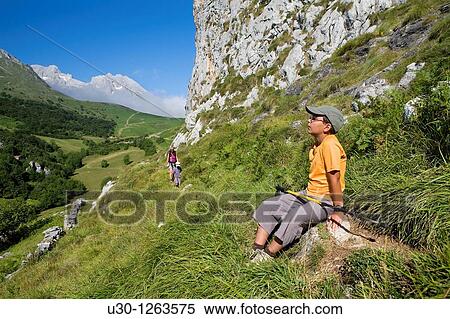 Stock Photography - Family practice mountaineering in the Urrieles massif, in the Picos de Europa National Park, Asturias, Spain. Fotosearch