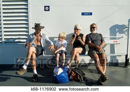 Family sitting on deck of a BC Ferry between Vancouver Island and Vancouver, BC, Canada View Large Photo Image Stock Image - Family sitting on deck of a BC Ferry between Vancouver Island and Vancouver, BC, Canada. Fotosearch