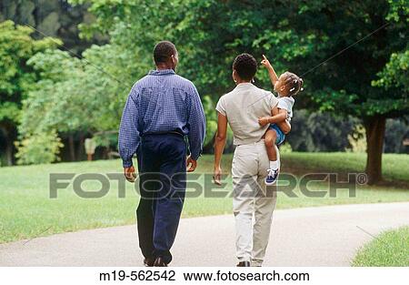 family strolling together View Large Photo Image Stock Image - family strolling together. Fotosearch