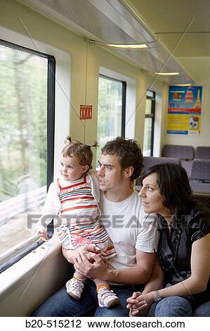 Family travelling in tramway. View Large Photo Image Stock Image - Family travelling in tramway.. Fotosearch