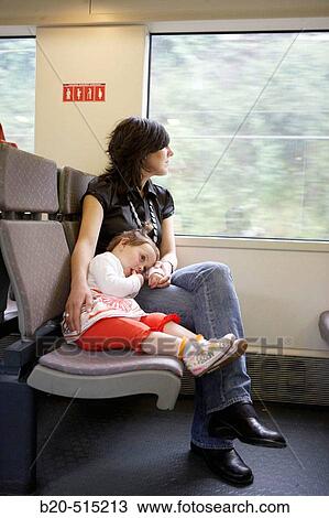 Family travelling in tramway. View Large Photo Image Stock Image - Family travelling in tramway.. Fotosearch
