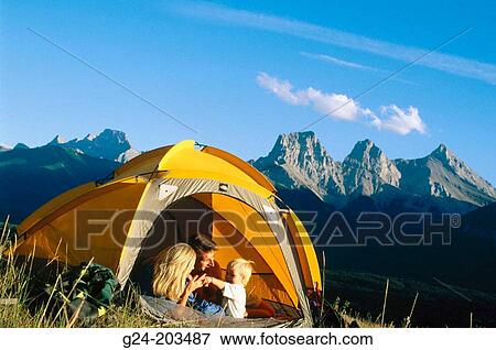 Family waking in tent in early morning. Banff National Park. Canada View Large Photo Image Stock Photo - Family waking in tent in early morning. Banff National Park. Canada. Fotosearch