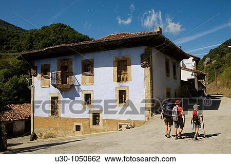 Family walking along the Espinama street, in Li? bana valley Picos De Europa National Park Cantabria Spain View Large Photo Image Stock Image - Family walking along the Espinama street, in Li? bana valley Picos De Europa National Park Cantabria Spain. Fotosearch