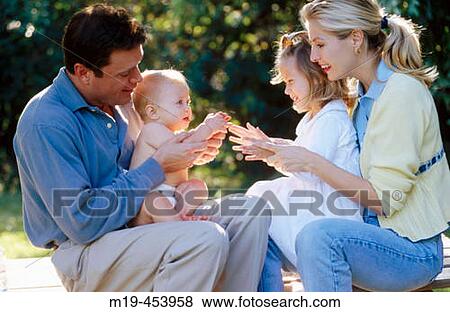 family with a baby View Large Photo Image Stock Photo - family with a baby. Fotosearch