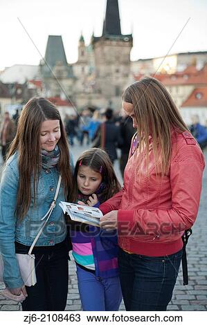 Family with a guide. Karluv Most - Charles Bridge. Prague. View Large Photo Image Stock Image - Family with a guide. Karluv Most - Charles Bridge. Prague.. Fotosearch