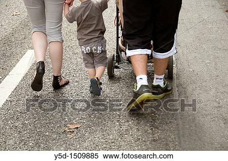 family with kids on a walk on the street, Geneva, Switzerland View Large Photo Image Stock Photography - family with kids on a walk on the street, Geneva, Switzerland. Fotosearch
