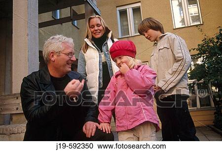 Family with two children (5 and 14). Stockholm. Sweden. View Large Photo Image Stock Image - Family with two children (5 and 14). Stockholm. Sweden.. Fotosearch