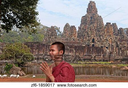 Famous Bayon Temple with your religious monk portrait in Siem Reap Cambodia Asia View Large Photo Image Stock Photo - Famous Bayon Temple with your religious monk portrait in Siem Reap Cambodia Asia. Fotosearch