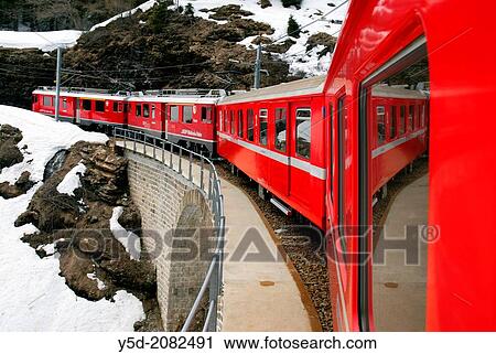 famous Bernina express train recorded in the list of UNESCO World Heritage for the beauty of the route, it is also highest adhesion railway of the continent, and one of the steepest adhesion railways in the world, Grisons canton, Switzerland, Europe. View Large Photo Image Stock Image - famous Bernina express train recorded in the list of UNESCO World Heritage for the beauty of the route, it is also highest adhesion railway of the continent, and one of the steepest adhesion railways in the world, Grisons canton, Switzerland, Europe.. Fotosearch